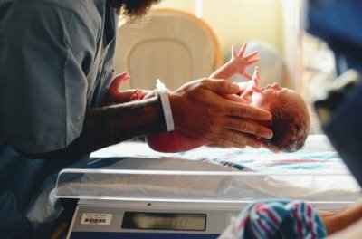 man holding baby