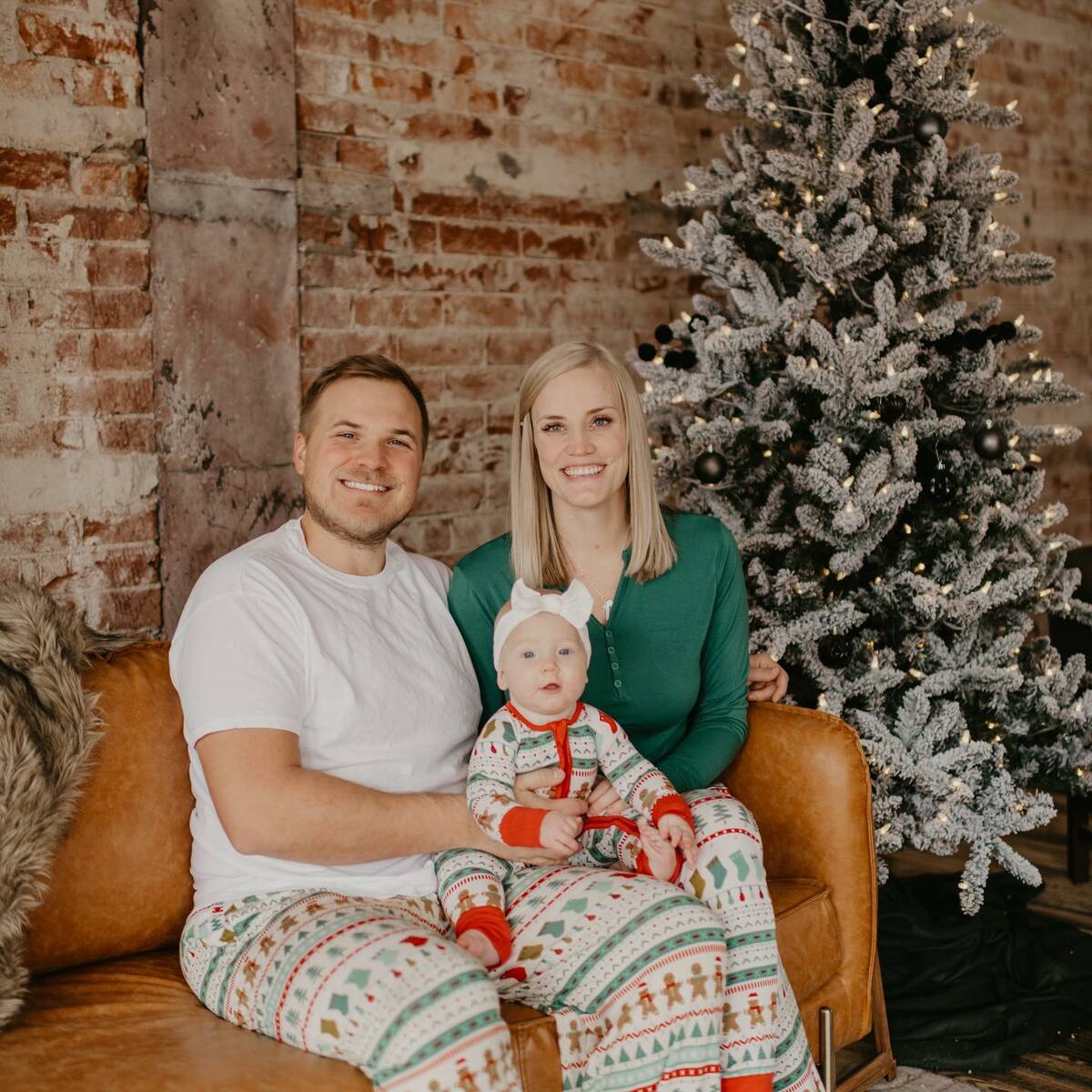 Doctors Dalton and Kristen Wood with baby