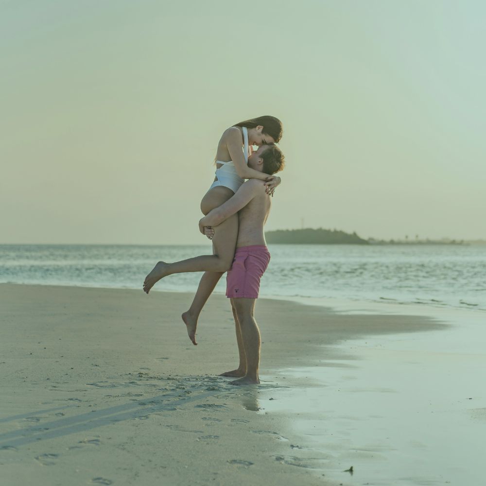 couple on beach on vacation