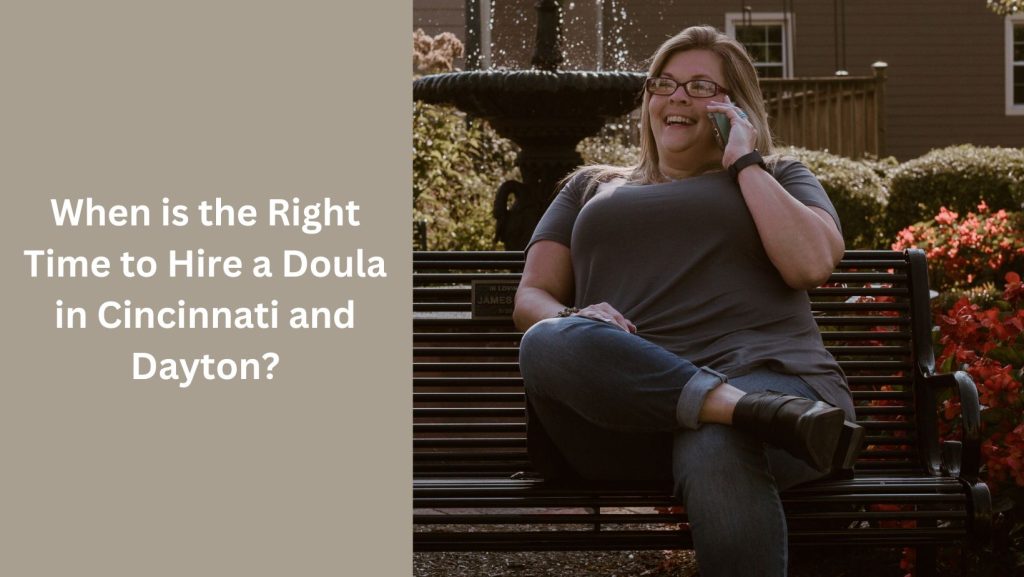 doula sitting on the bench while talking on the phone