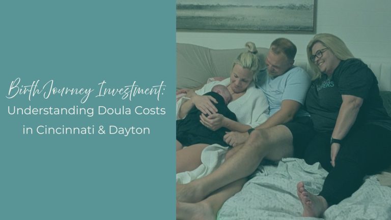 Doula on bed with clients after a homebirth with newborn baby